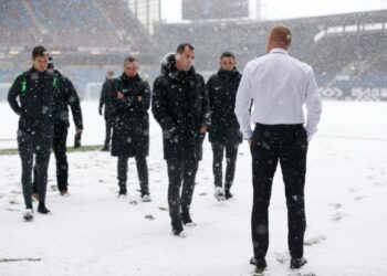 BURNLEY’S GAME AGAINST TOTTENHAM HOTSPURS AT TURF MOOR POSTPONED AFTER HEAVY SHOW STEAL THE PITCH