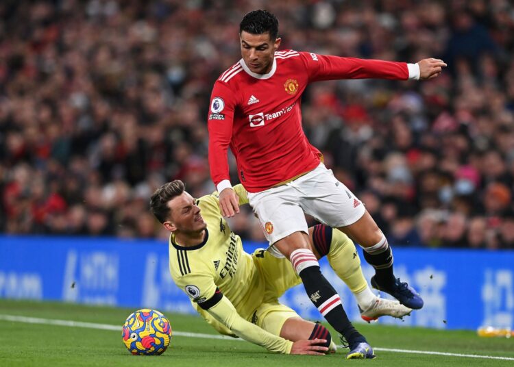 MANCHESTER UNITED PULLS A SPIRITED COME BACK AGAINST ARSENAL AT THE OLD TRAFFORD